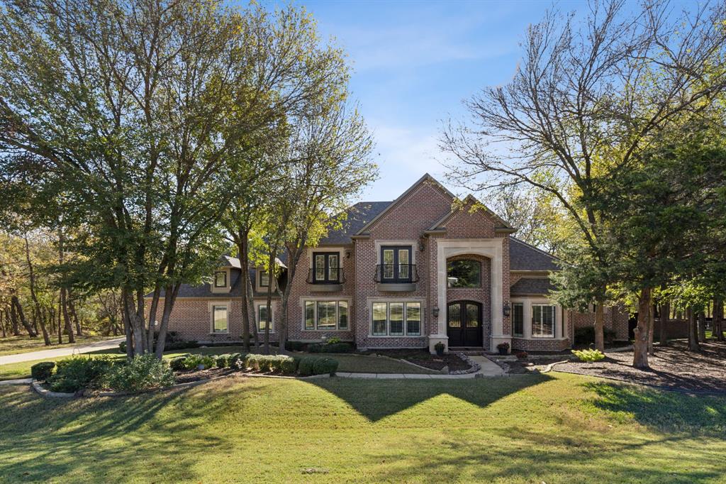 View of front of home featuring a front lawn