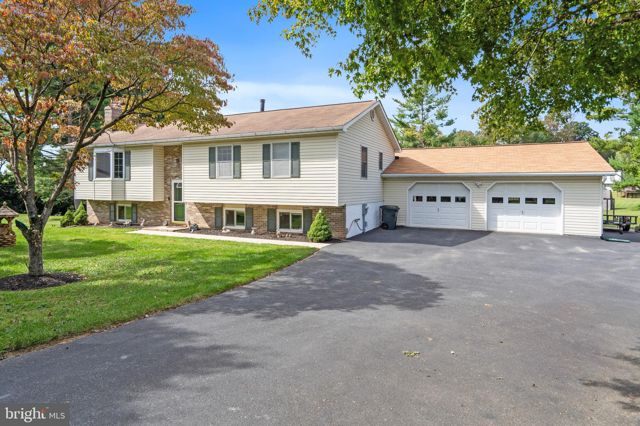 2 Car Garage Plus Additional Driveway Parking