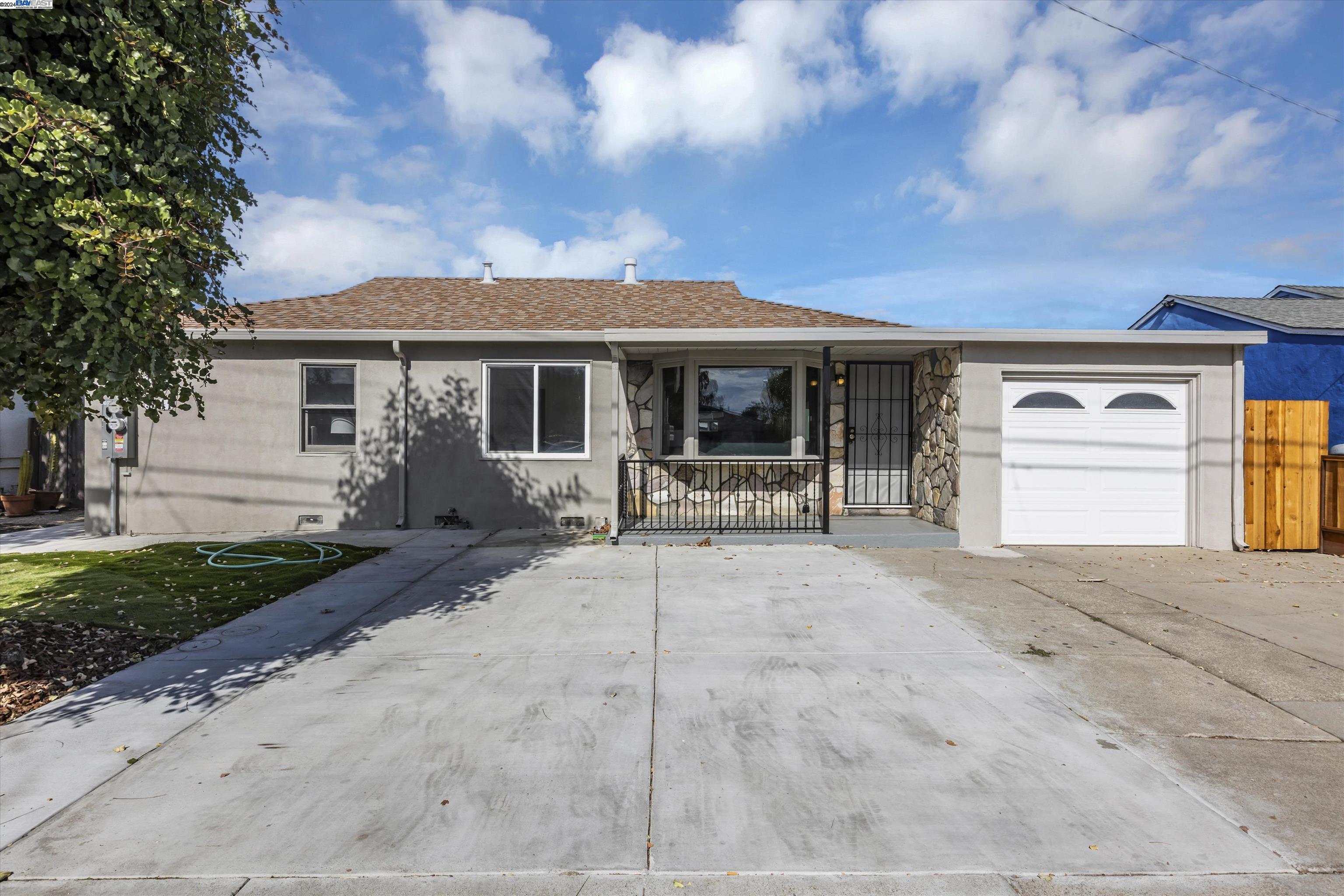 a view of house with outdoor space and porch