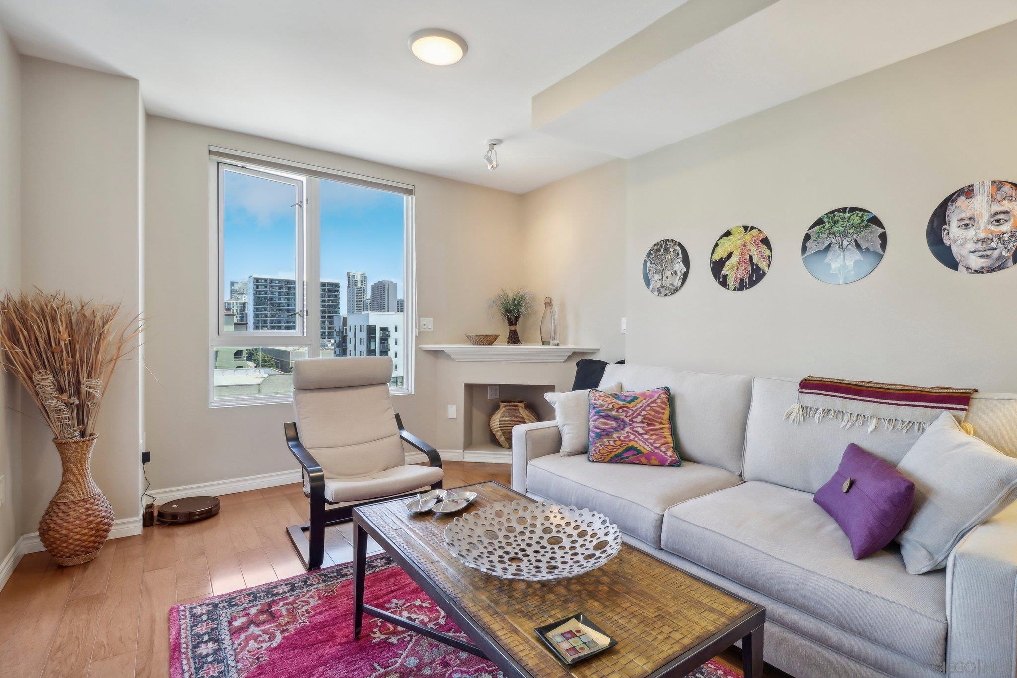 a living room with furniture and a rug