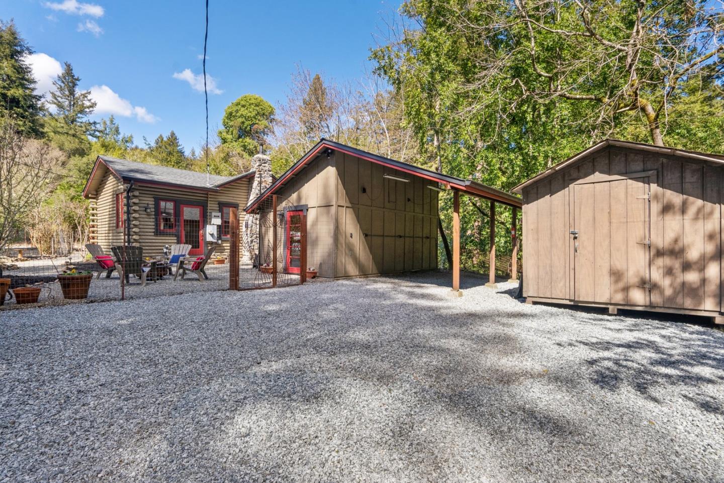 a view of a house with a yard and garage