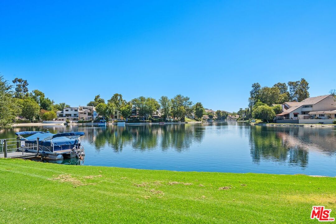 a view of a lake with a house