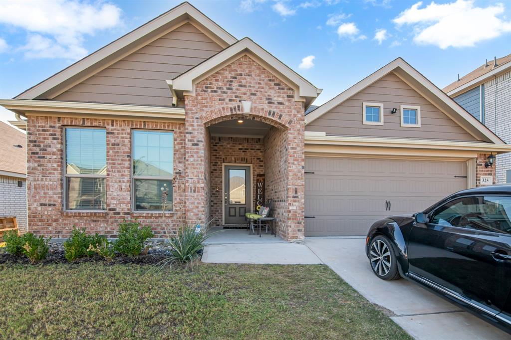 a view of a car in front of house