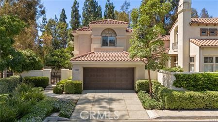 a front view of a house with yard