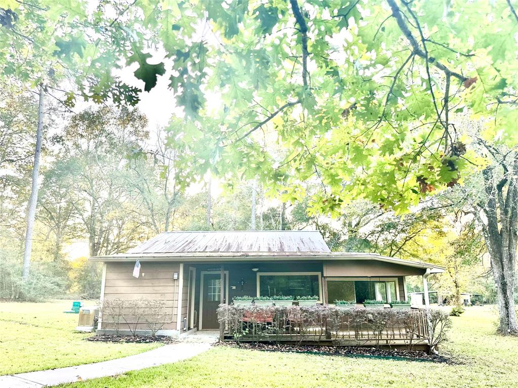 a front view of a house with yard