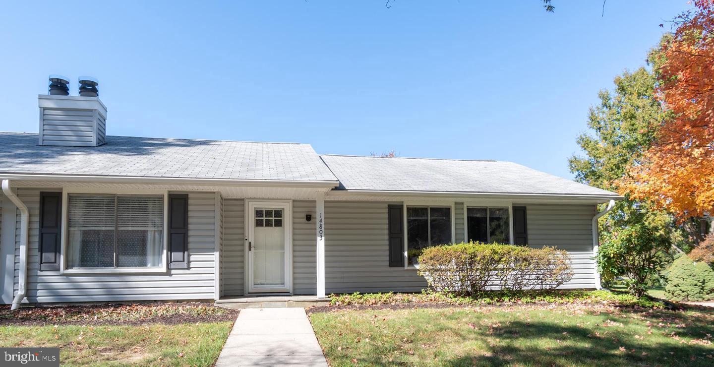 a front view of a house with yard