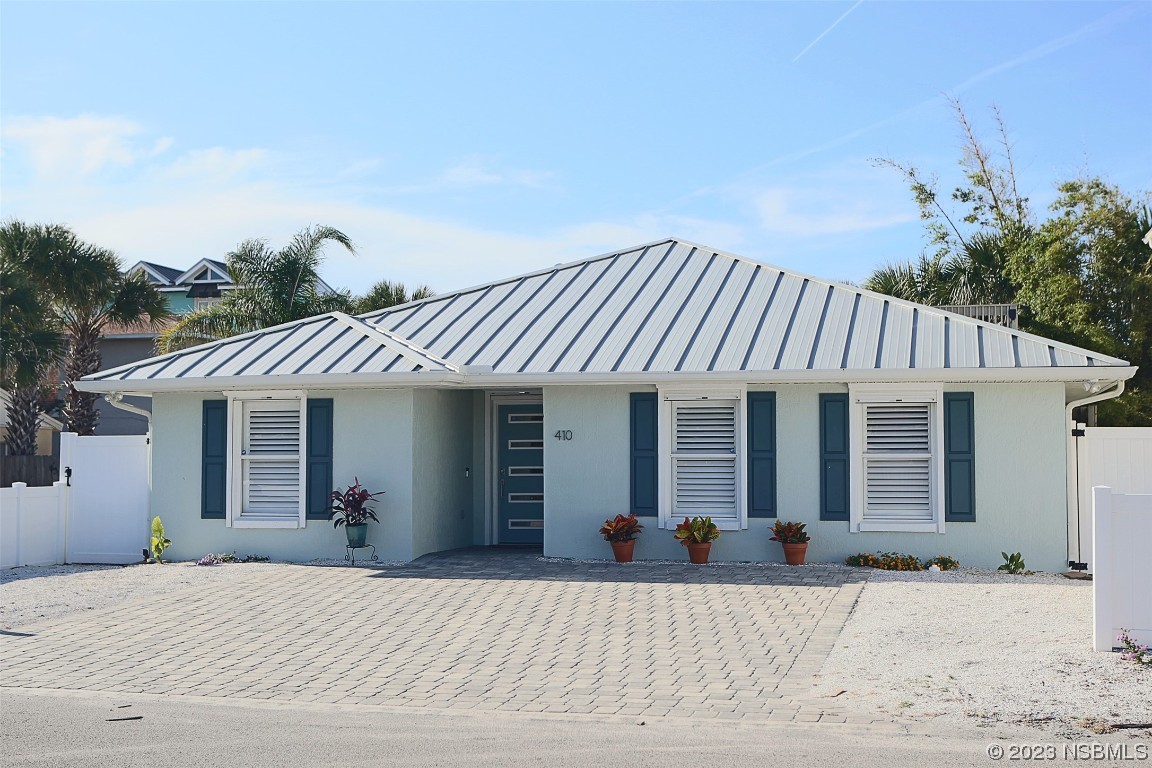 a view of a house with a patio