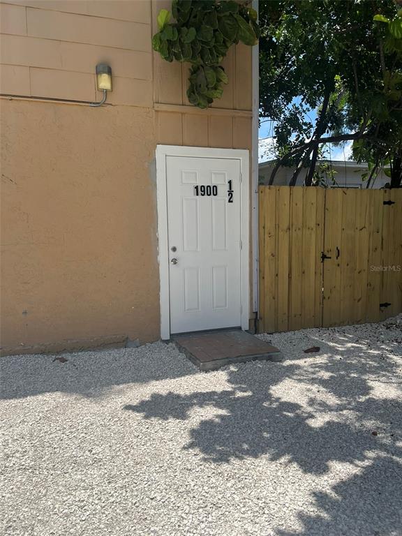 a view of a door in front of a house