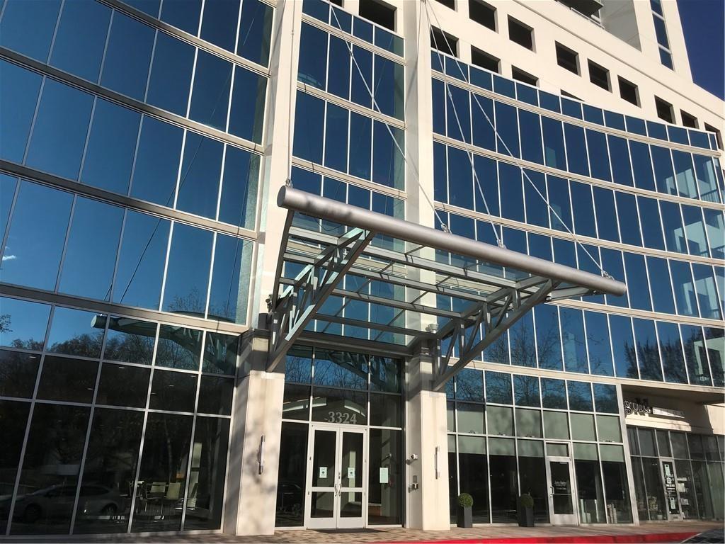 a front view of a building with glass windows