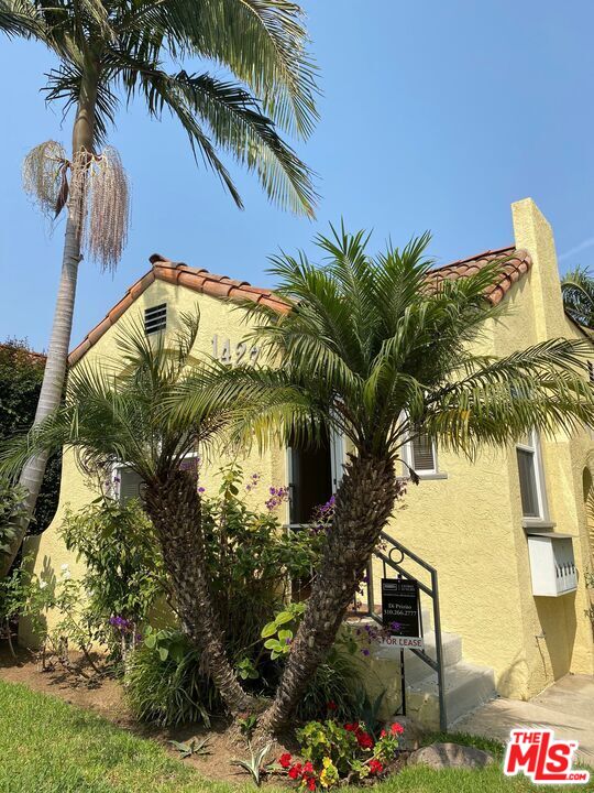 a view of swimming pool with a garden