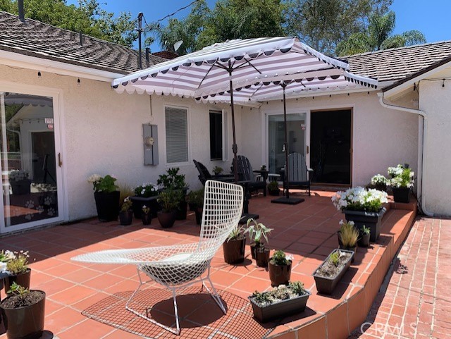 a view of a house with patio