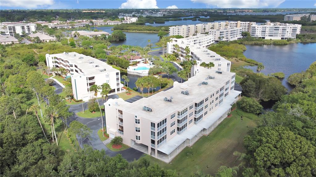 a view of a lake with big yard