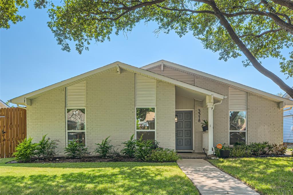 a front view of house with yard