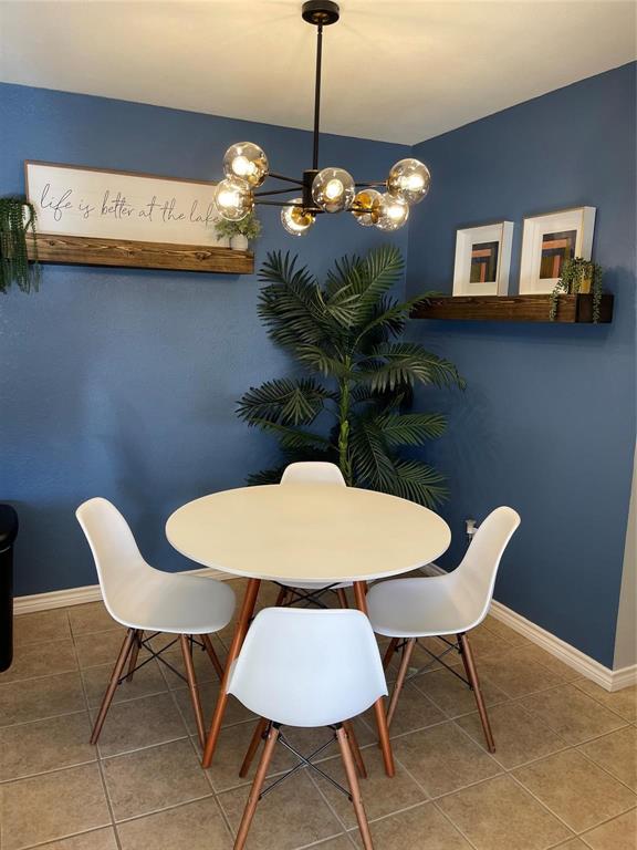 a table and chairs in a room