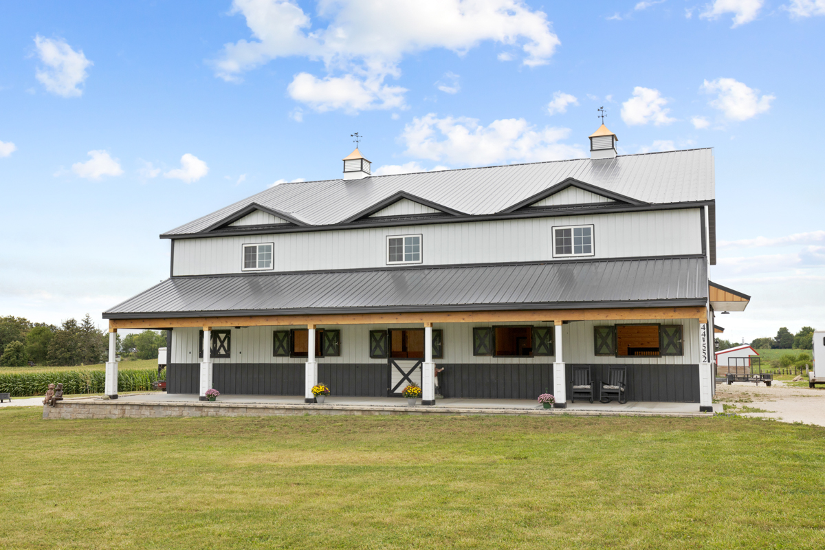 a front view of a house with swimming pool