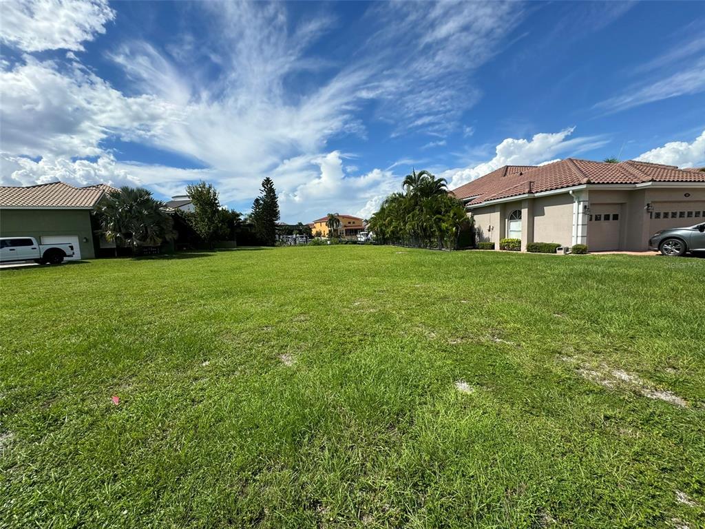 a view of a house with a big yard