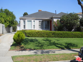 a view of a house with a garden