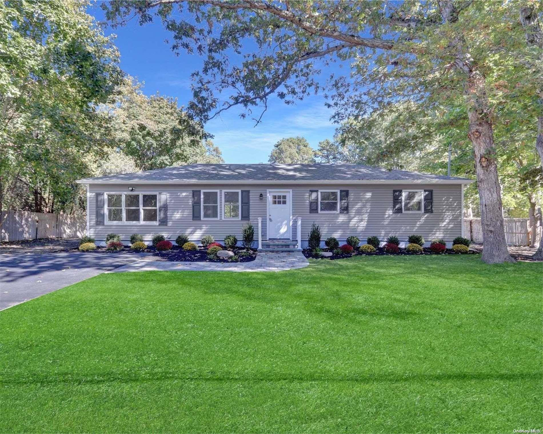 a view of a house with backyard porch and garden