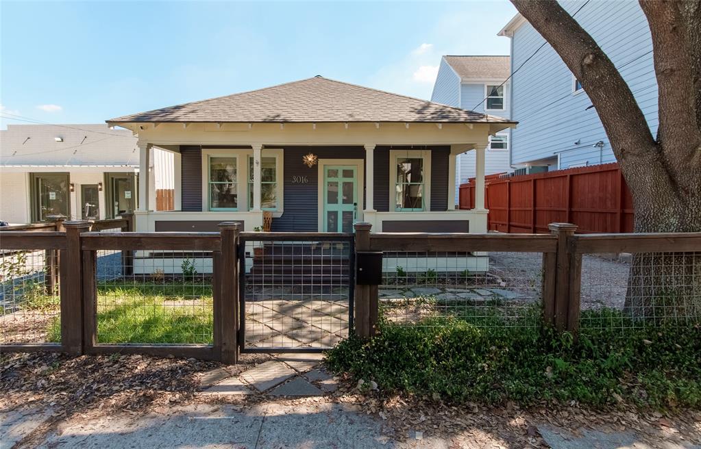 a front view of a house with a porch