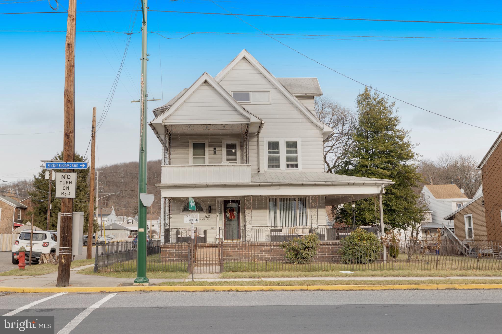 a front view of house with yard