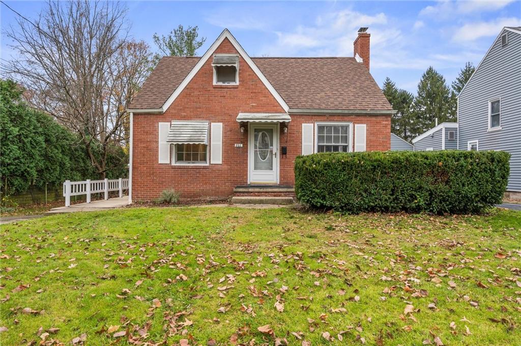 Front, 2 story brick cottage