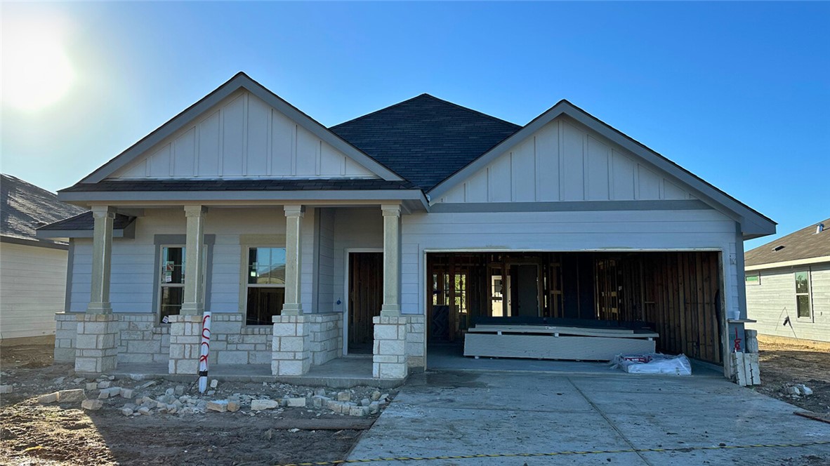 View of front of property featuring covered porch