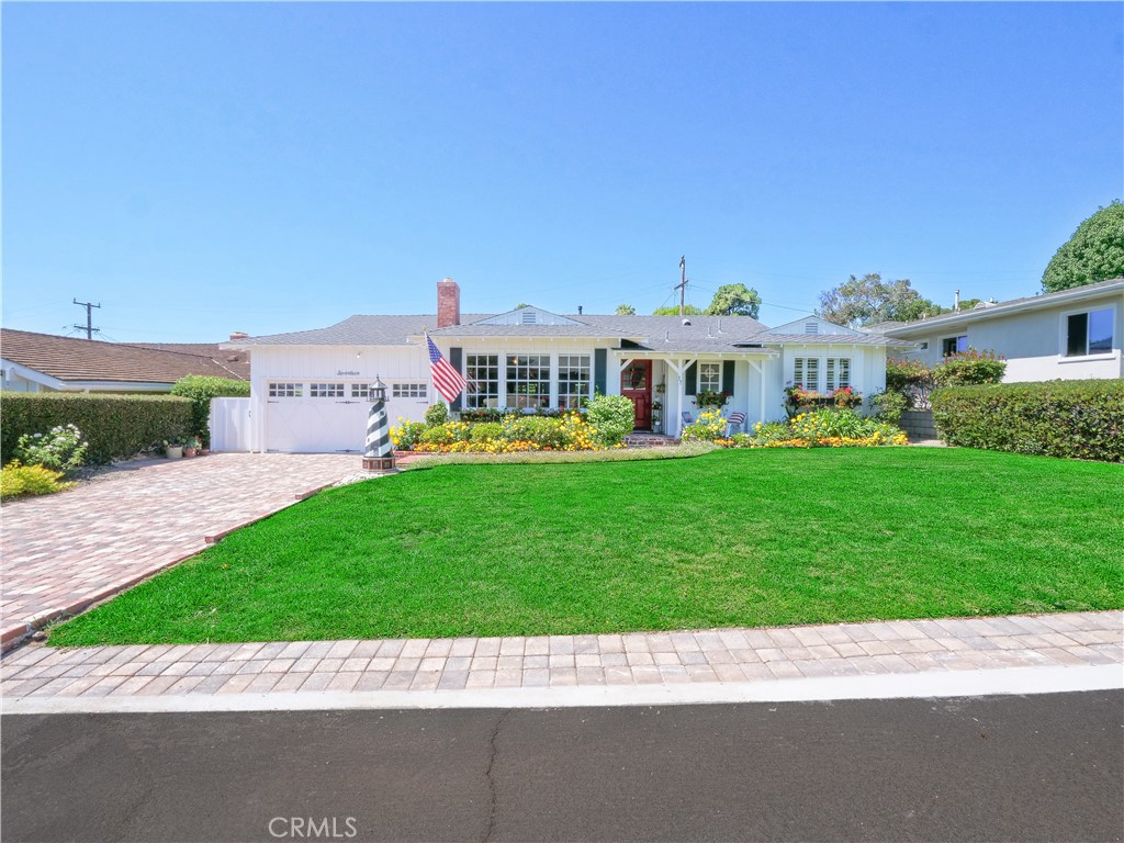 a view of a house with a back yard