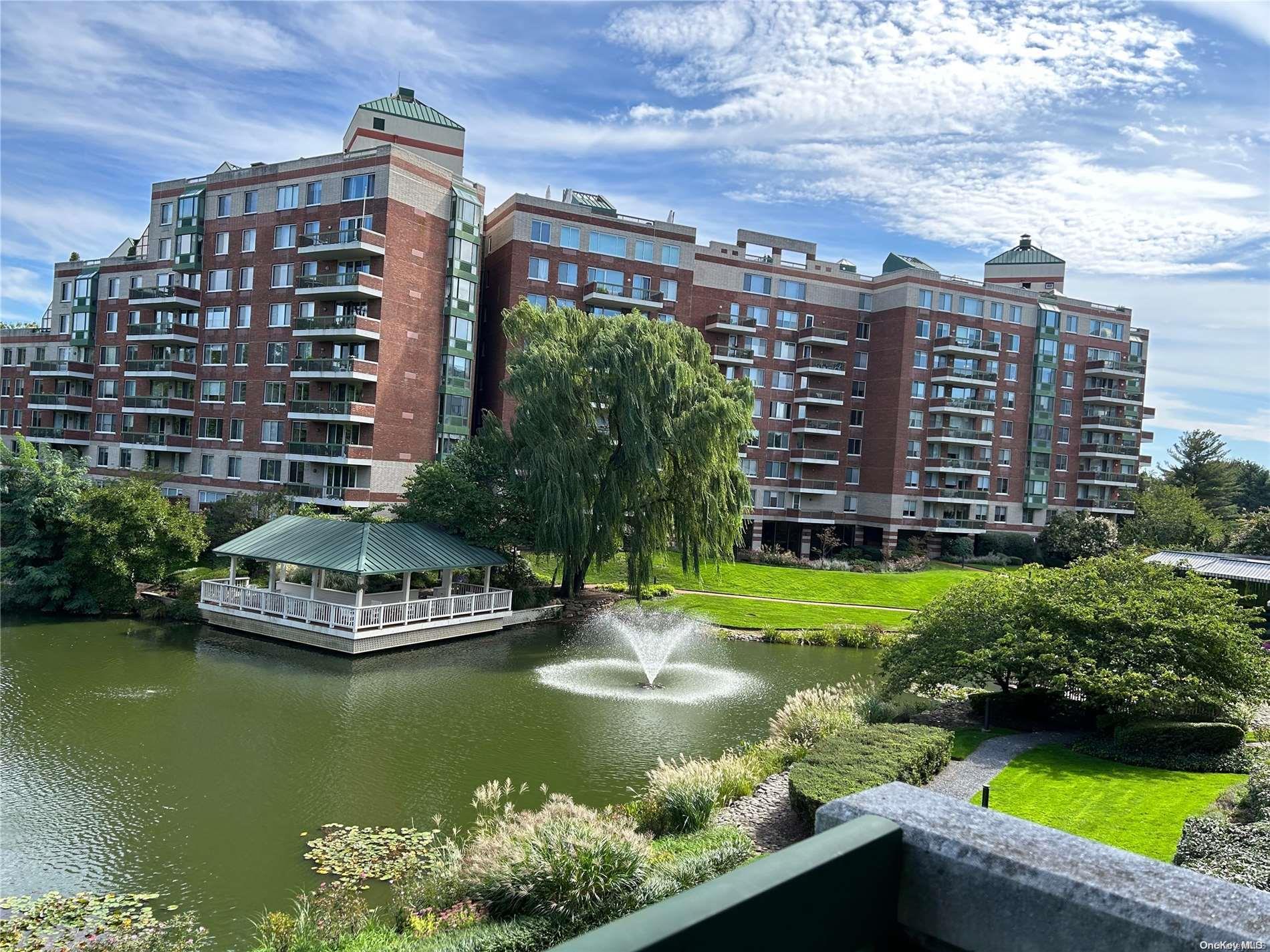 a view of a swimming pool with a garden