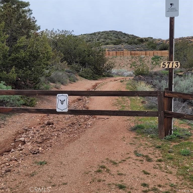 a view of a road with an ocean view