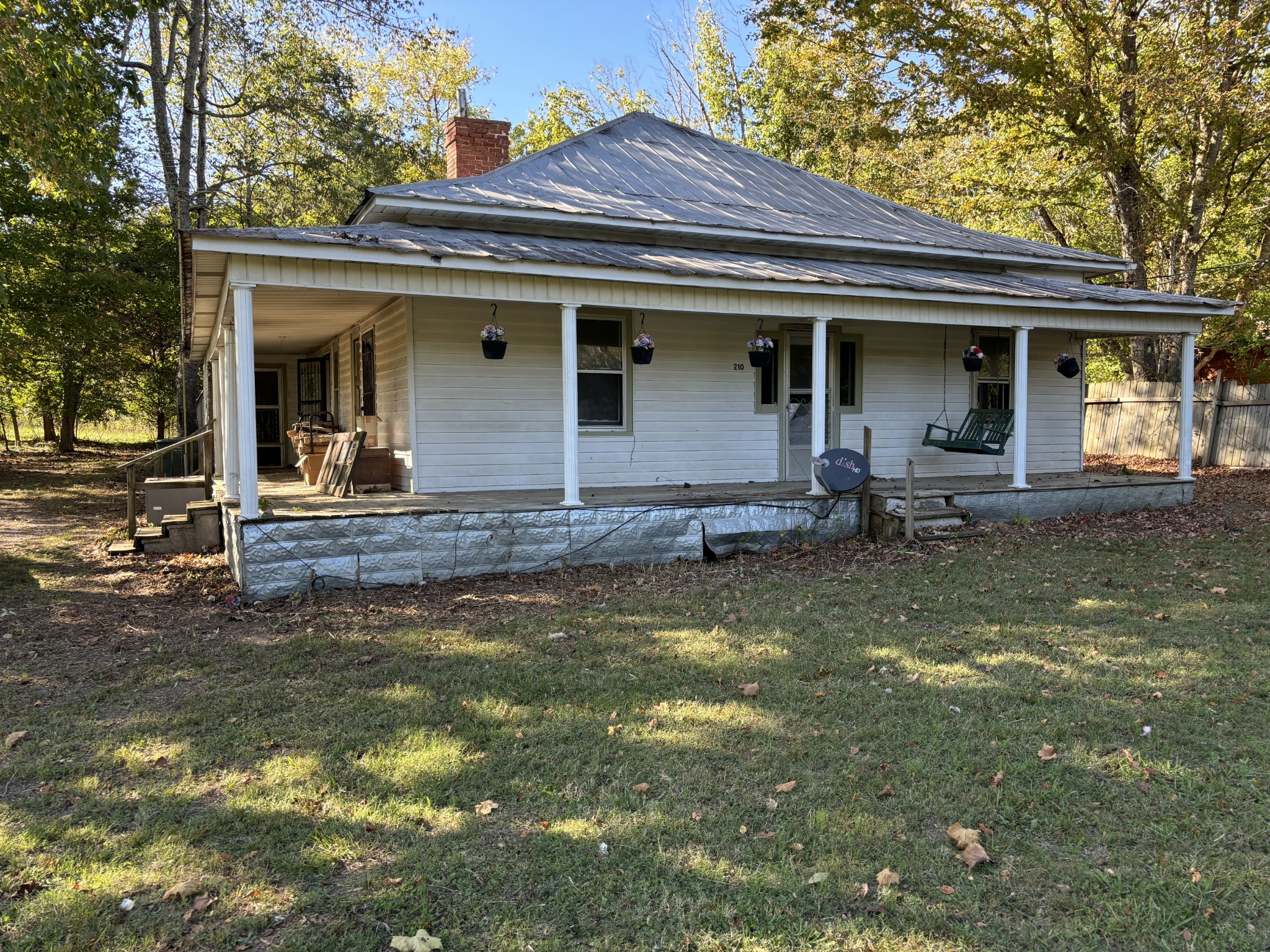 a front view of a house with swimming pool