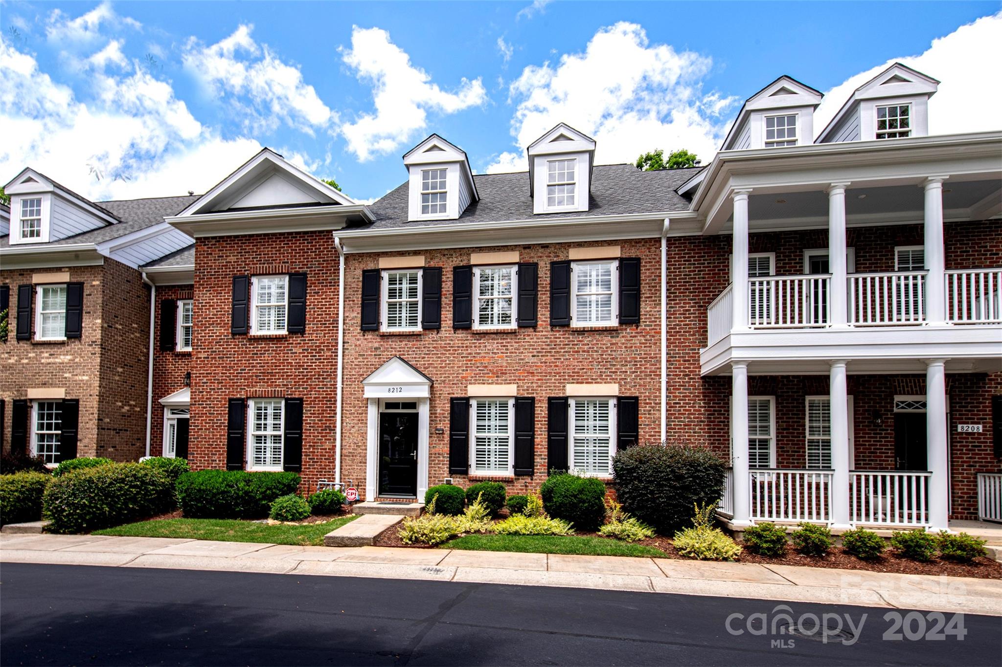 a front view of residential houses