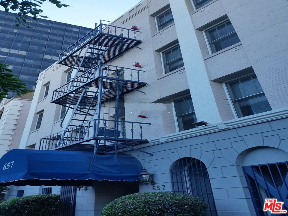 a view of a house with a roof deck