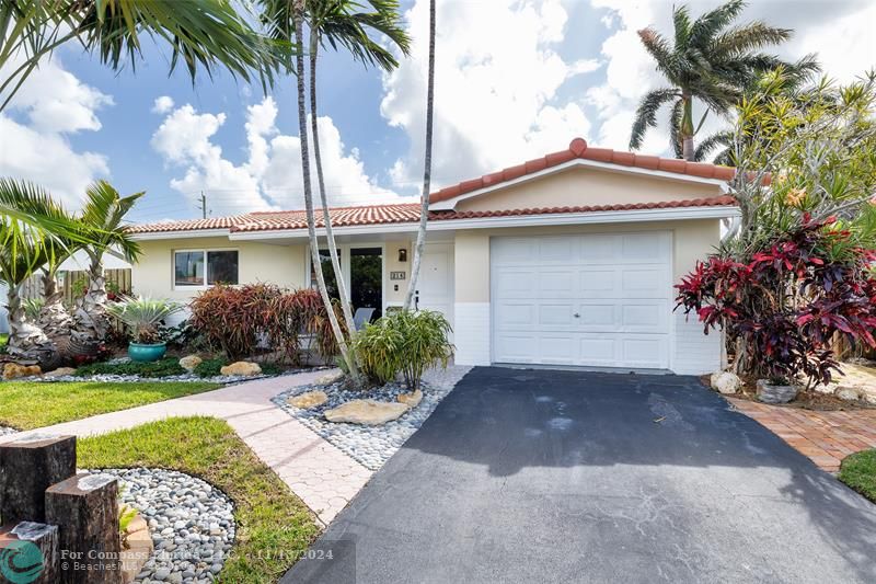 Lush landscaping and palm trees