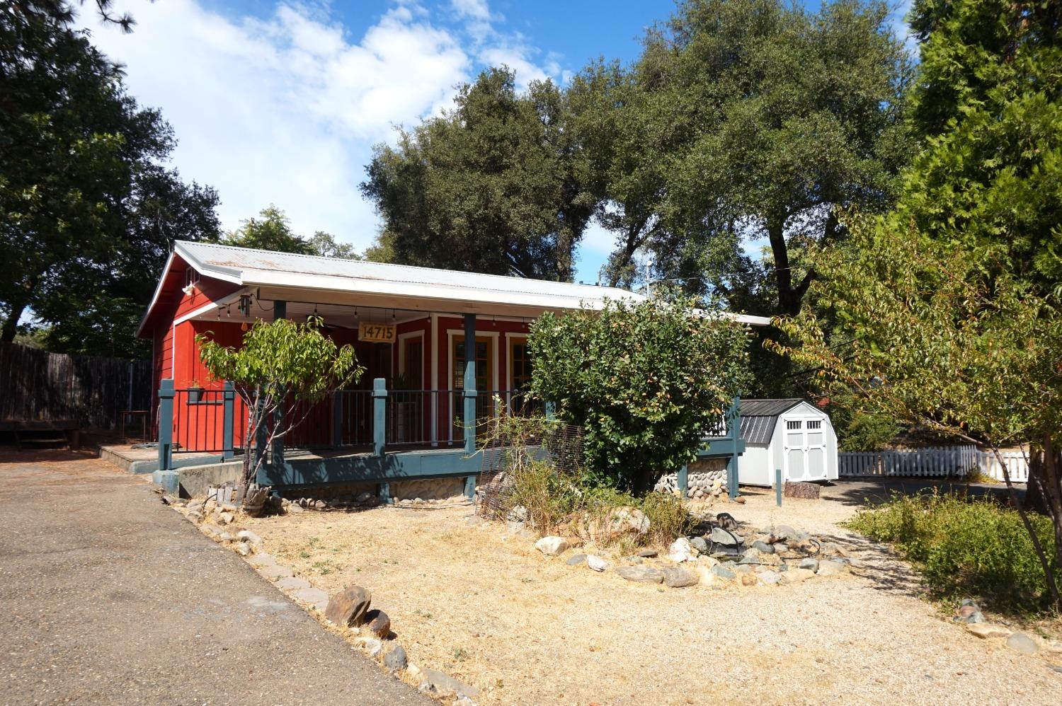 a view of wooden fence and a yard