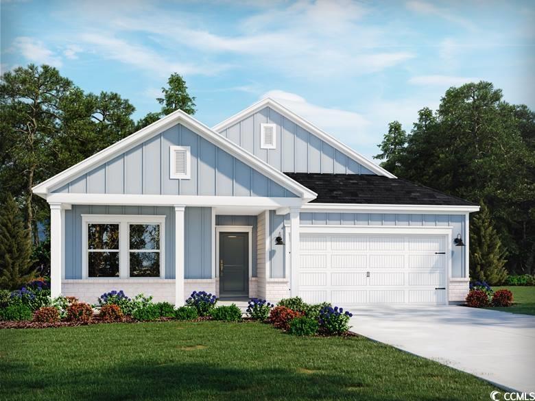 View of front of home featuring a front yard and a