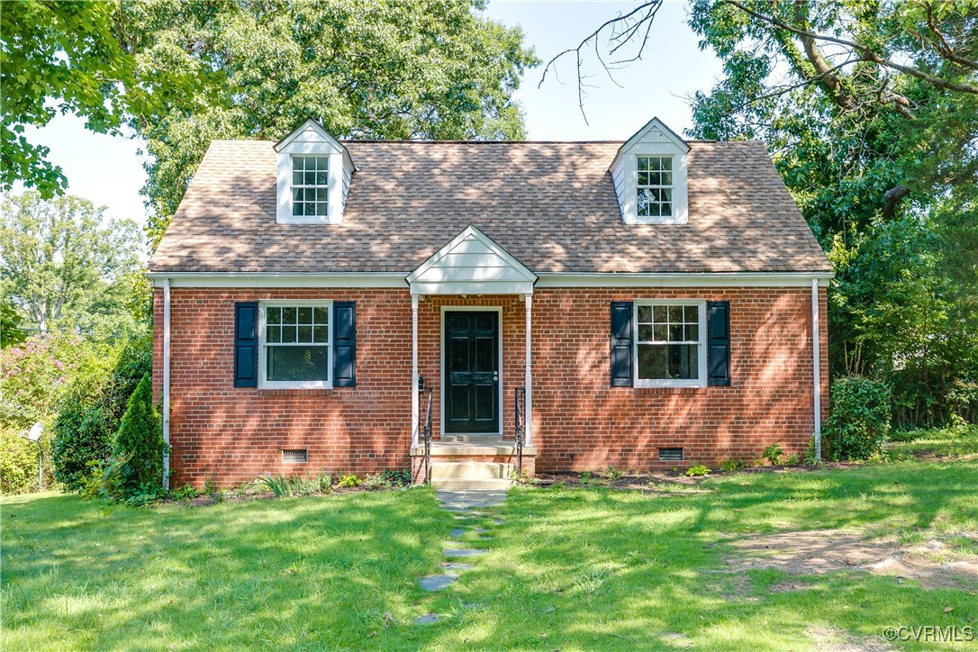 front view of a house with a yard