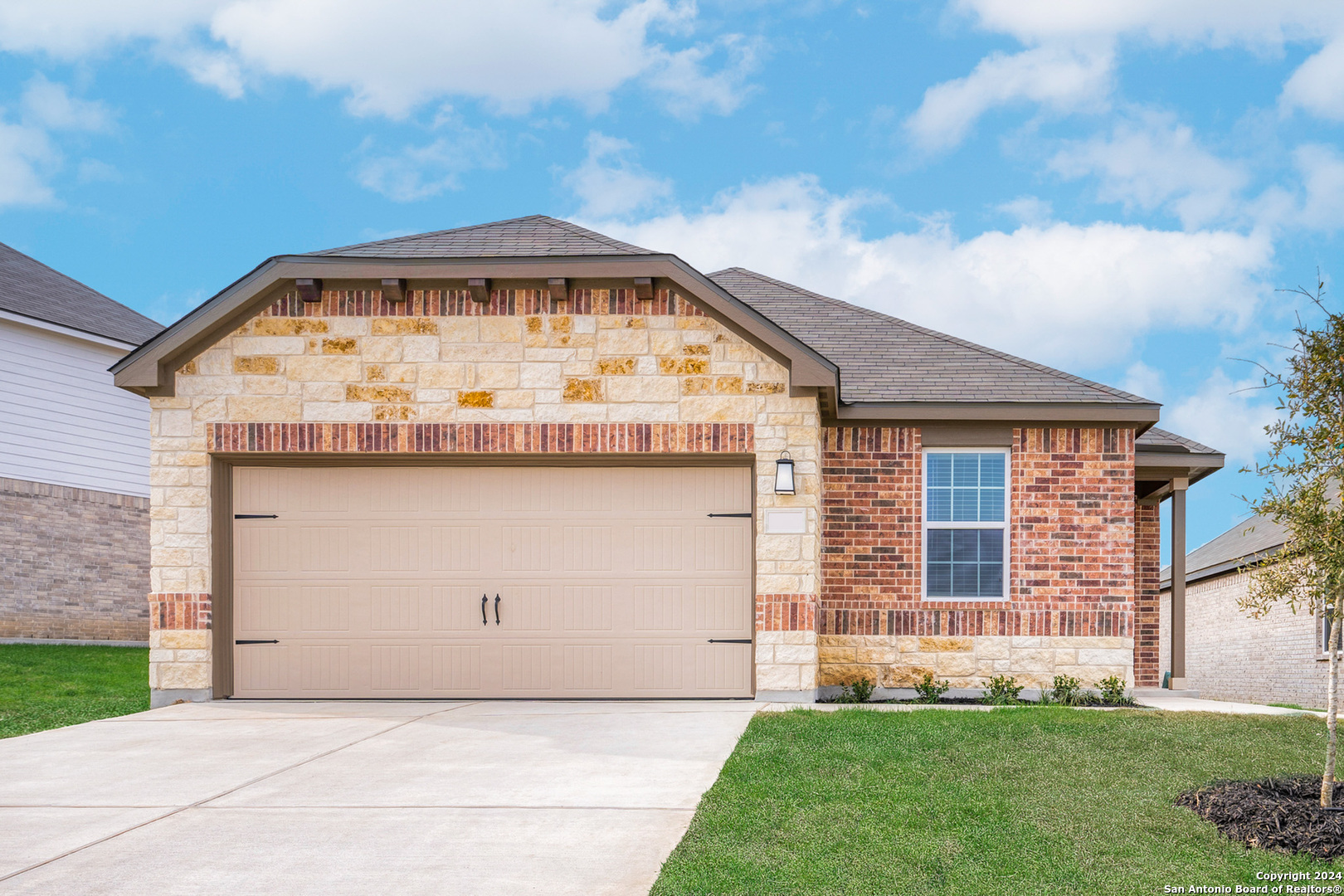 a front view of house with yard