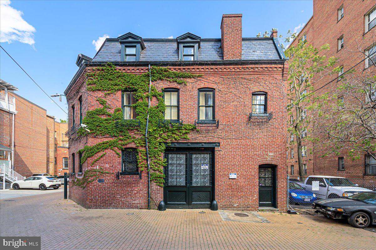 front view of a house with a street