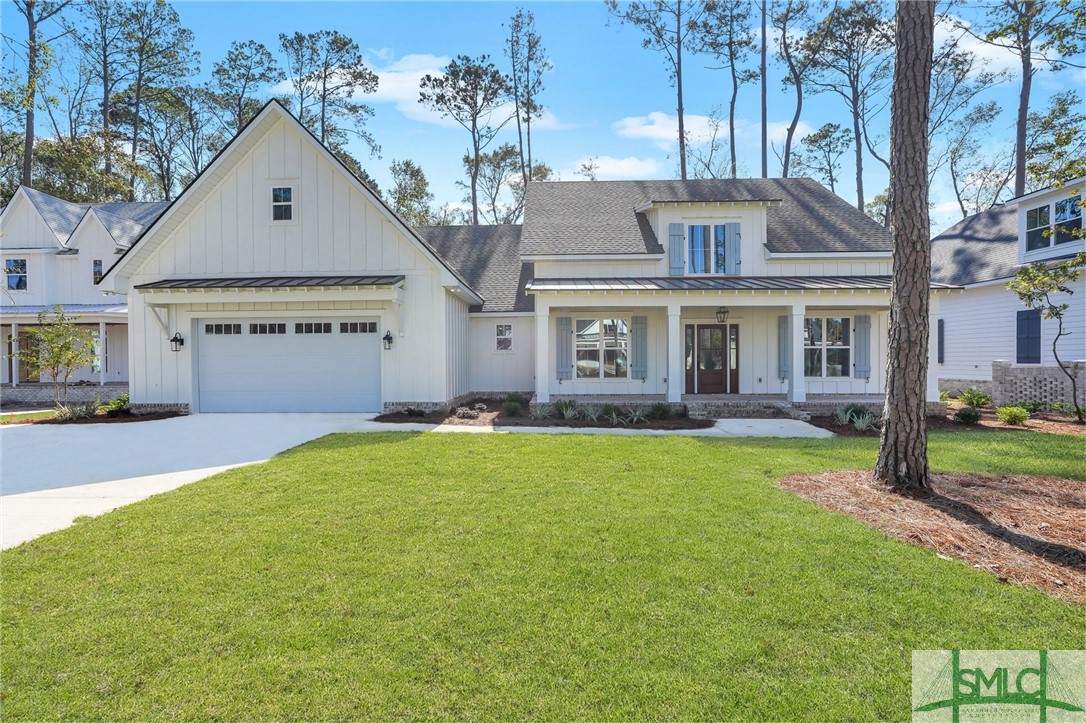 Much larger than a 2 car garage!  Another door on