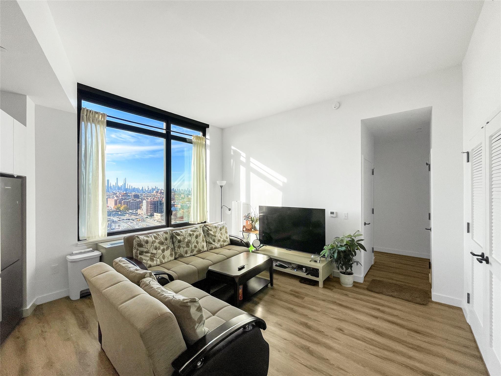 Living room featuring light hardwood / wood-style flooring