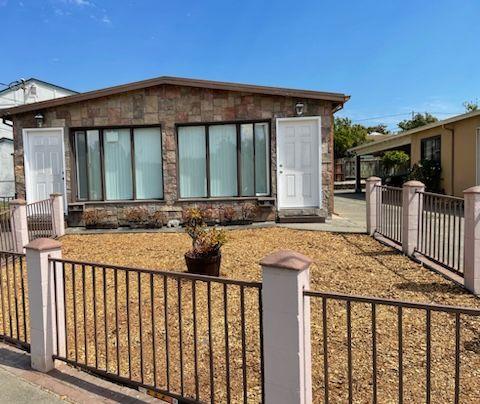 a front view of a house with a porch