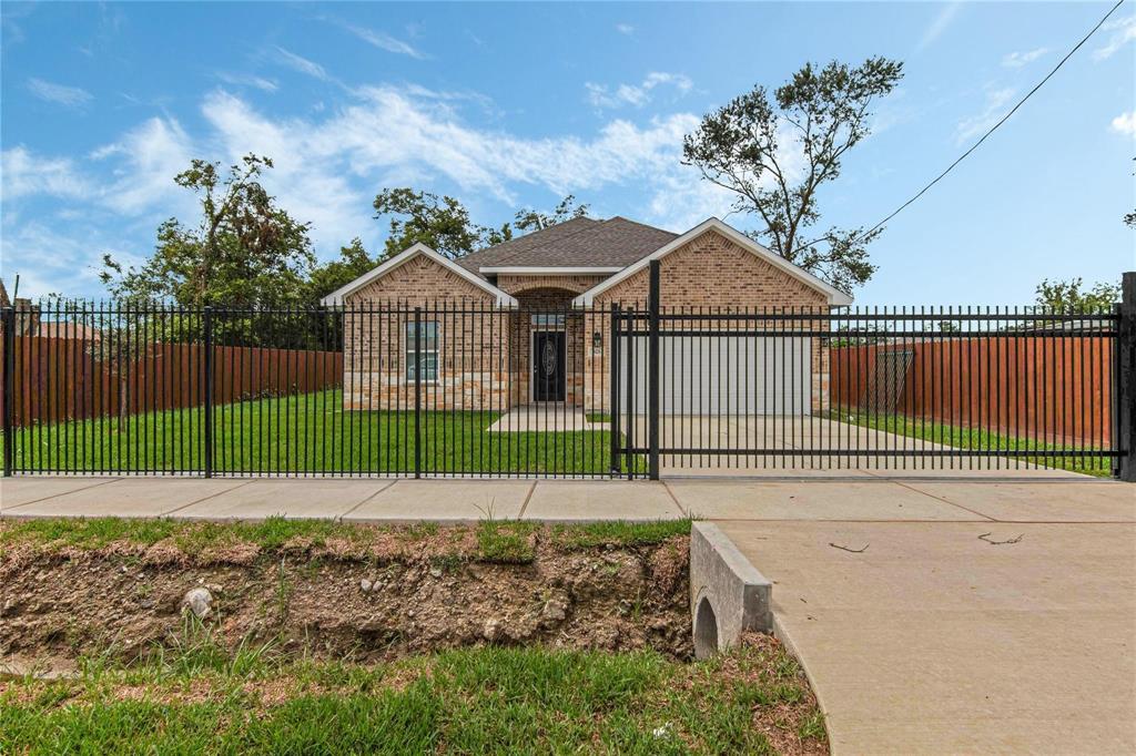 a house with a garden and a yard