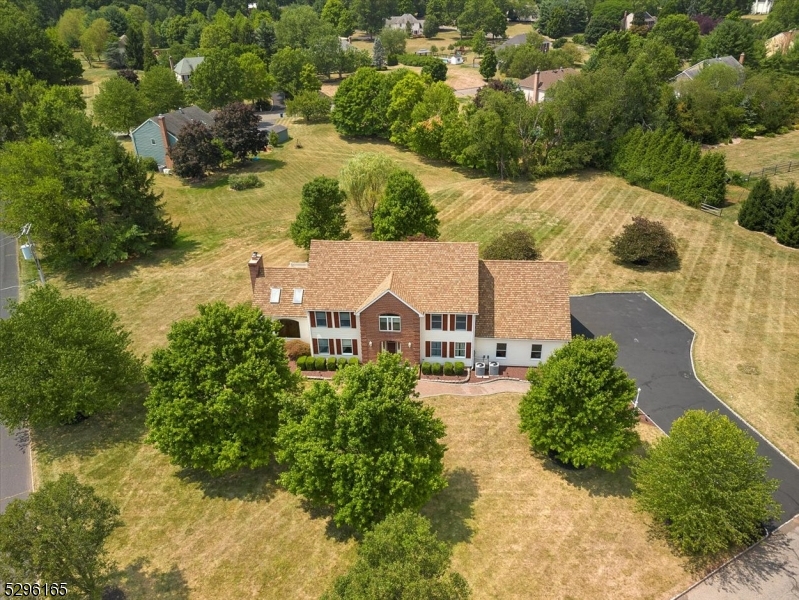 an aerial view of house with yard