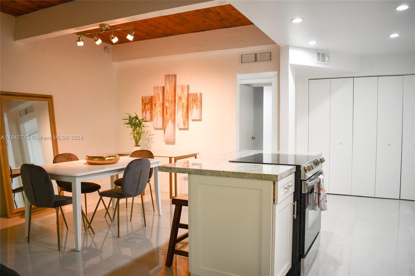 a view of a dining room with furniture