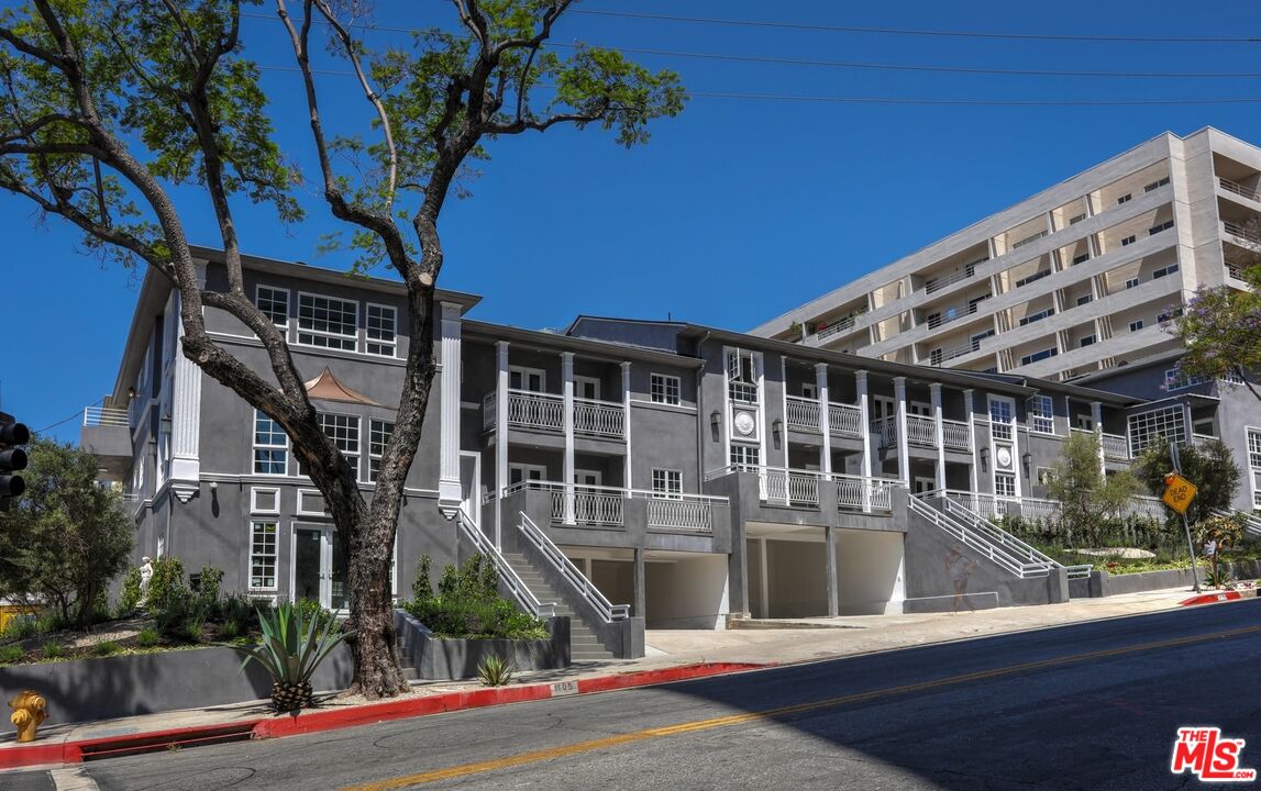 a view of a building with a street