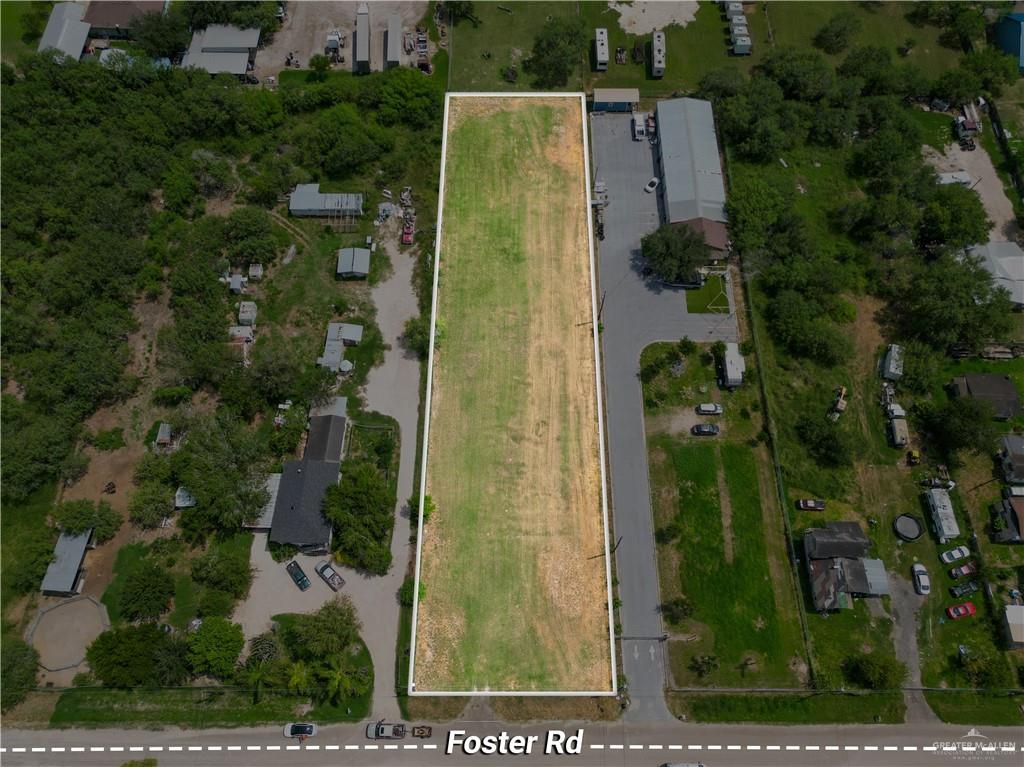 an aerial view of residential house with outdoor space