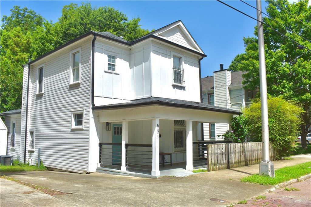 a front view of a house with a garage