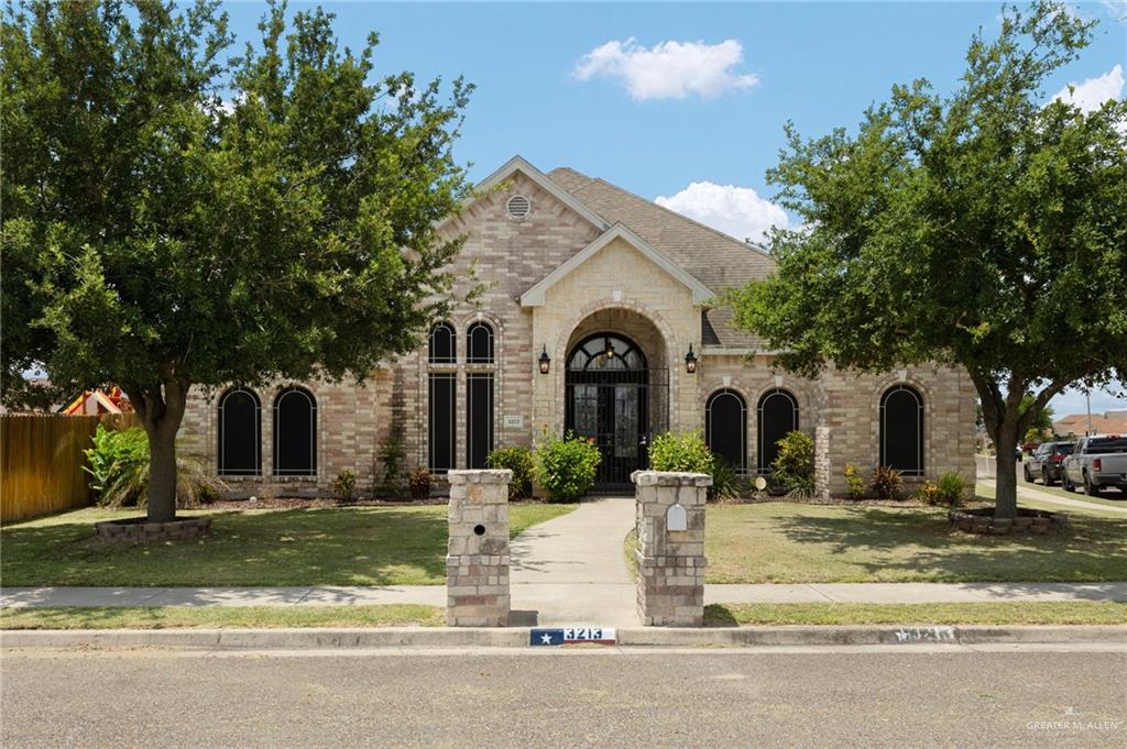 View of front of house with a front yard