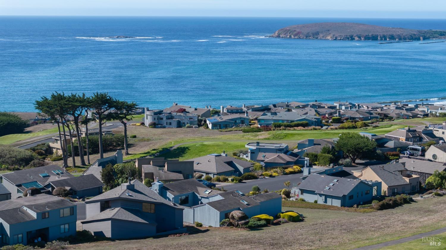 a view of a city with ocean view