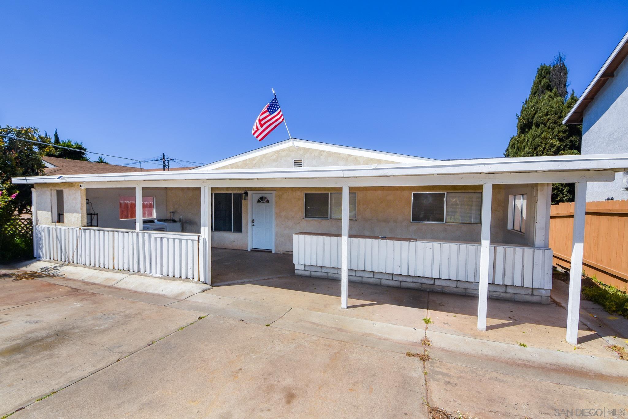 a front view of a house with a garage